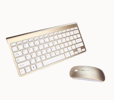 Gold keyboard and mouse set on a white background