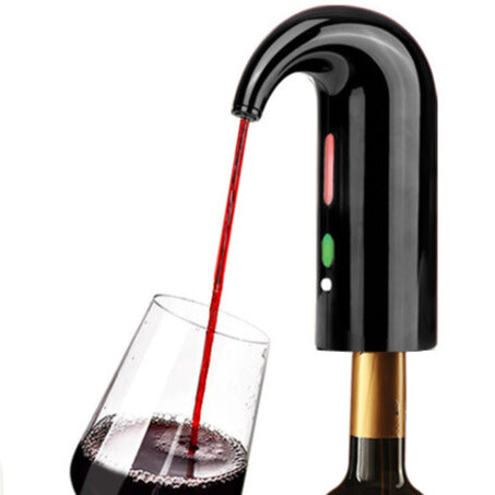 Black wine aerator pouring red wine into a glass on a white background