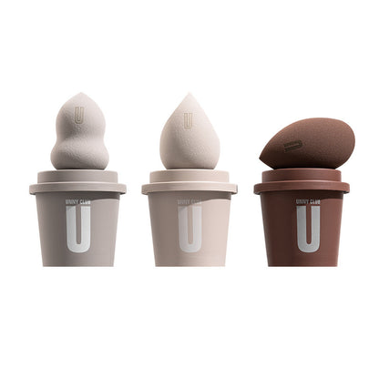 Three makeup blending sponges in different colors with 'U' branding on a white background